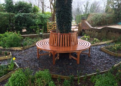 Bench round a tree