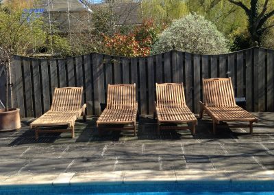 Sun loungers by a pool